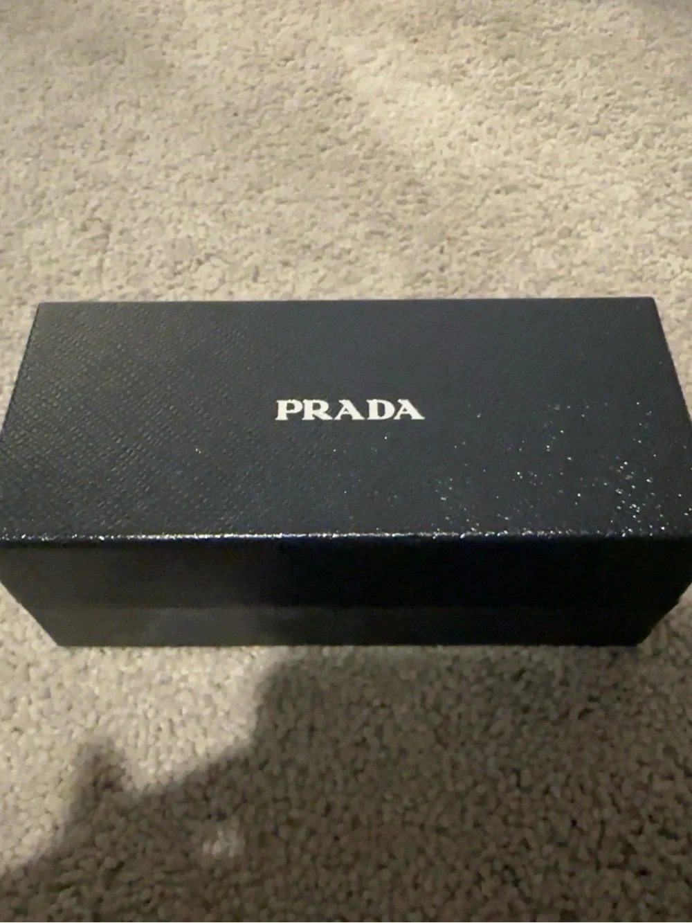 Prada Black Round Sunglasses with Brown-Tinted Lenses
